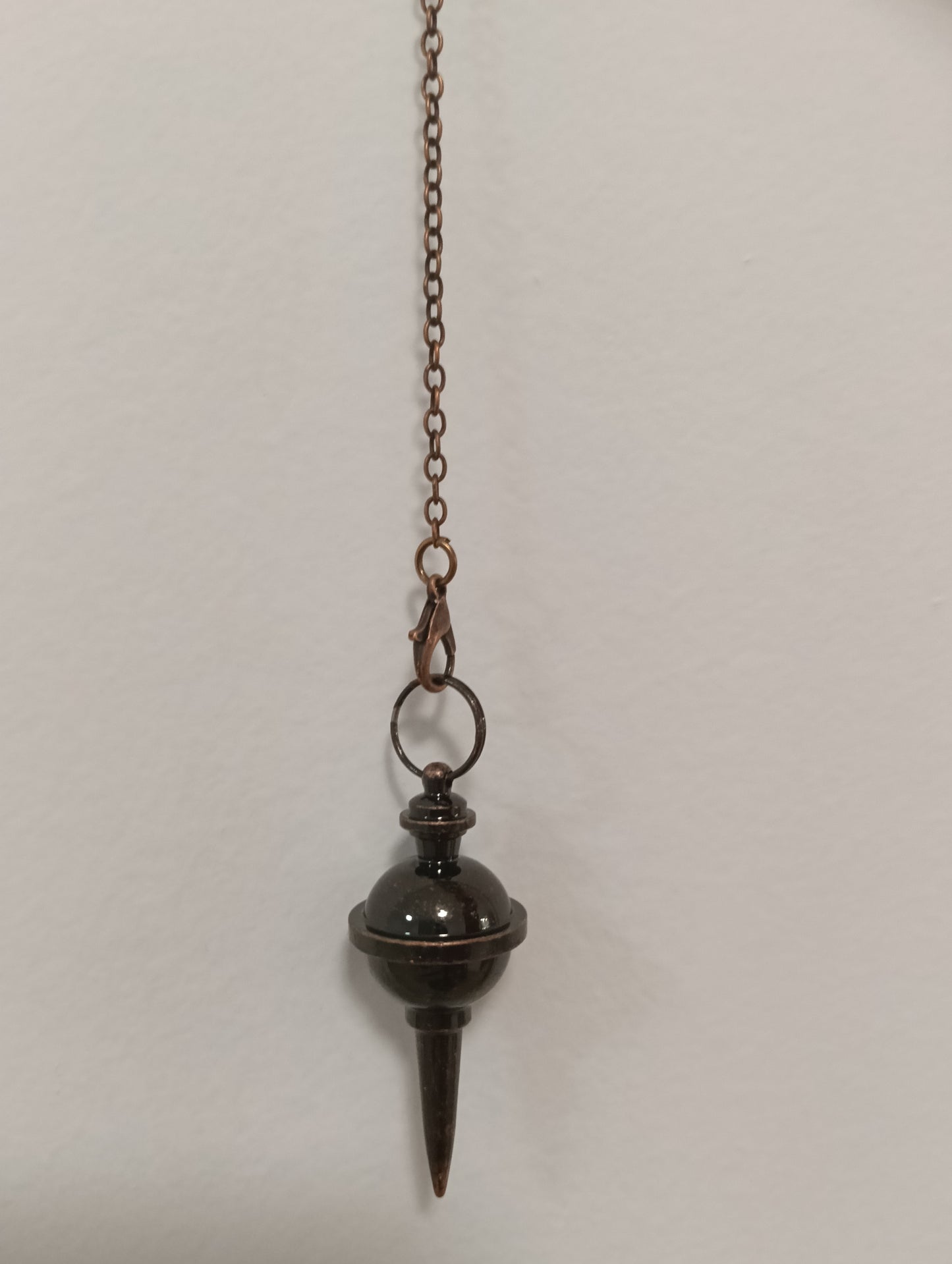 Péndulo de metal