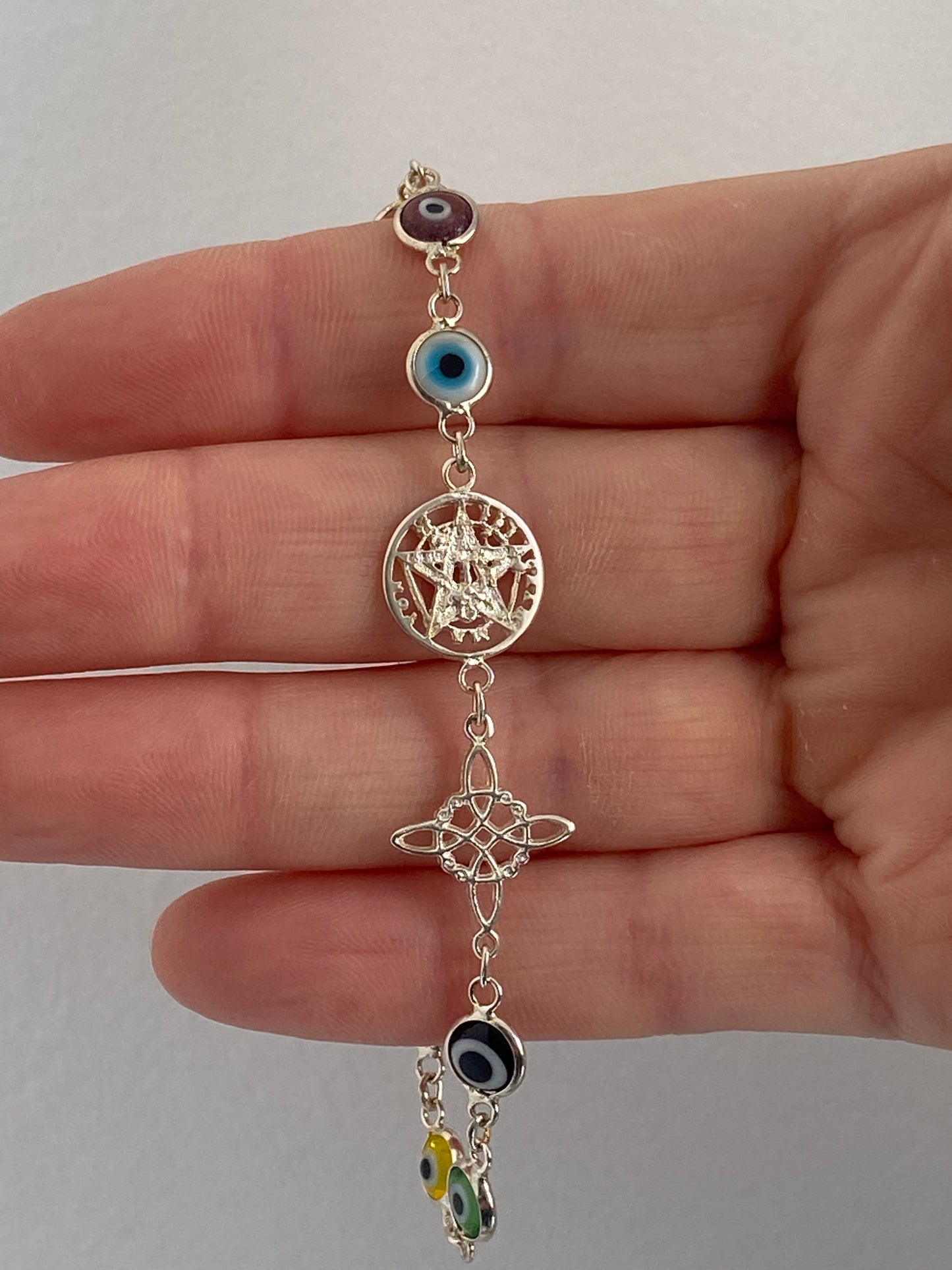 Pulsera Plata Triple Protección (Ojo Turco, Tetragramatón, Nudo Bruja)