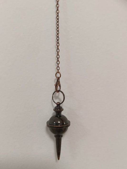 Péndulo de metal